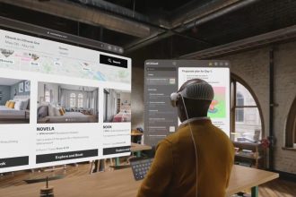 A man using Vision Pro as a computer, as covered during WWDC 2023.