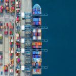 Industrial import-export port prepare to load containers.