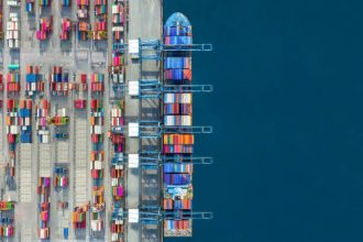 Industrial import-export port prepare to load containers.